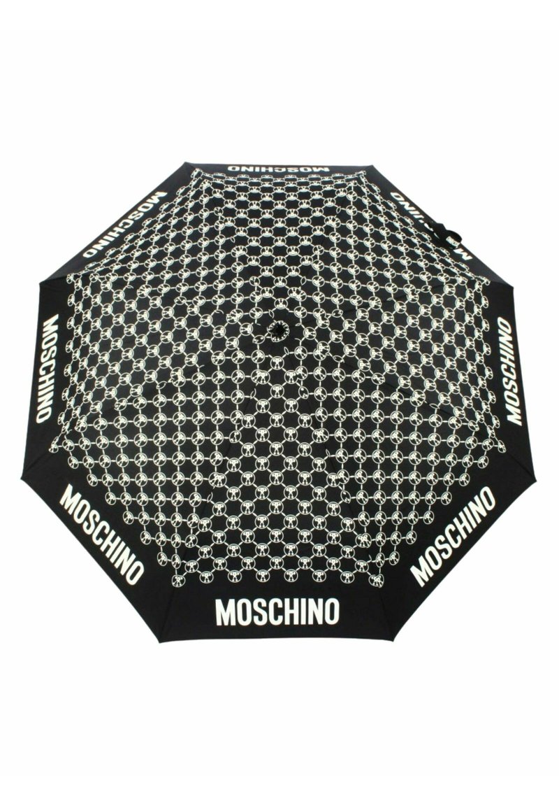 Schwarzer Regenschirm mit sich wiederholendem Muster aus weißen Teddy-Bären-Gesichtern und großen weißen "MOSCHINO"-Schriftzügen an jedem Panelrand.