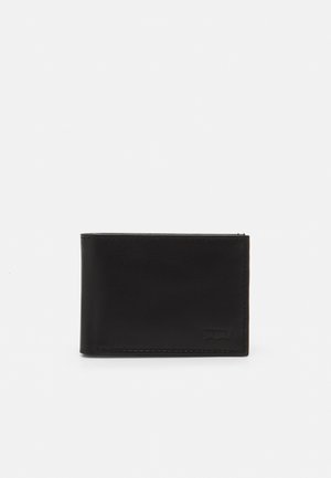 Black leather wallet with a sleek design, smooth texture, and visible stitching. Features a small logo on the front. Compact rectangular shape.