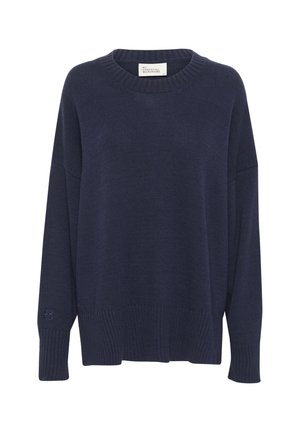 Navy blue knit sweater with a crew neckline, dropped shoulders, and ribbed hem. Features a small logo on the left sleeve. Soft texture.