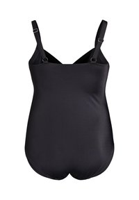 Must musta varrukateta ujumistrikoo reguleeritavate rihmadega, siledapinnaline ja keha järgiva lõikega. Seljaosa on veidi ümar, rõhutades voolujoonelist kuju.