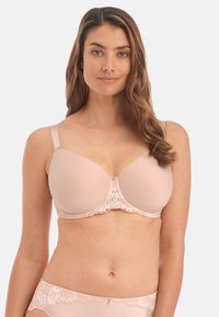 Lichtroze beha met gladde stof, gevormde cups en kantdetails in het midden en op de banden. Verstelbare banden voor een goede pasvorm.