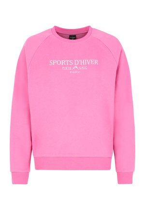 Pink sweatshirt with raglan sleeves, featuring a white printed logo "SPORTS D'HIVER PISTE CHIC" on the front. Soft, textured material.