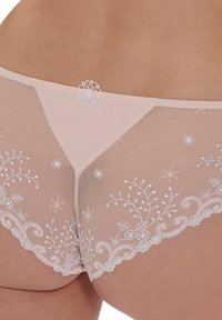 Light pink sheer underwear featuring intricate white floral embroidery and lace trim along the edges, emphasizing a delicate design.