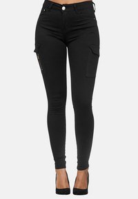 Elara Pantalones cargo - schwarz