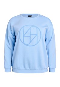 Ljusblå sweatshirt med långärmar, rund halsringning och ribbad ärm. Har en texturerad cirkulär logga i en något mörkare blå nyans.