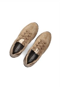 Tan suede sneakers with textured accents, featuring lace-up design and metallic details on the heel. Soft, cushioned interior lining.