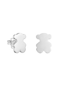 Orecchini a forma di orsacchiotto in argento con una superficie liscia e riflettente, dotati di chiusura a perno e bordi arrotondati.