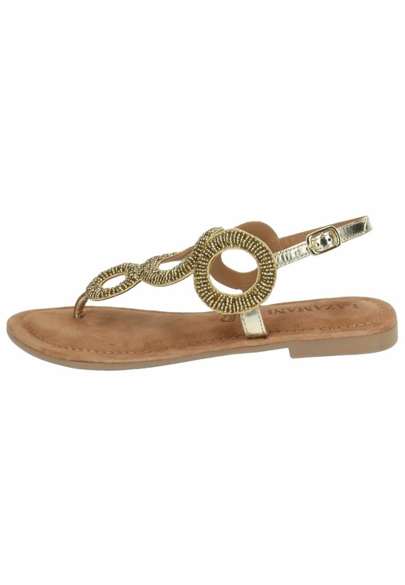 Sandali piatti dorati con un design decorativo di perline e accenti circolari. Cinturino alla caviglia regolabile e una soletta marrone testurizzata.
