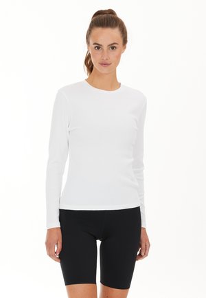 Athlecia LANGARM  - T-shirt à manches longues - white
