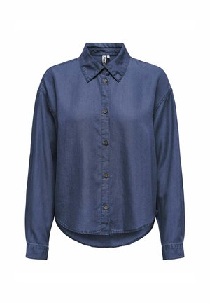 Tumši zila džinsu krekls ar apkakli, garām piedurknēm, pogām priekšpusē un noapaļotu apakšu. Mīksta auduma ar gludu tekstūru.