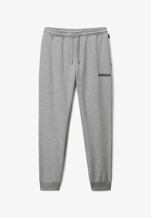 Pantalones de chándal grises hechos de tejido suave, con una cintura elástica y cordón, puños ajustados y un pequeño logo en el bolsillo lateral.