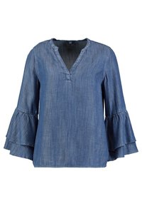Top di jeans con scollatura a V, maniche lunghe con polsini a campana a due livelli e vestibilità rilassata in un lavaggio blu medio.