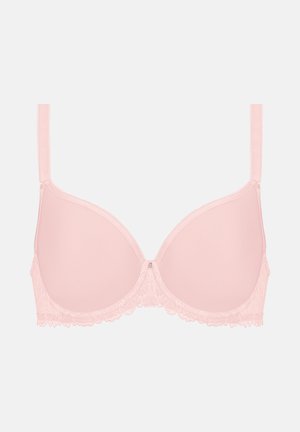 Soutien-gorge rembourré rose clair avec armature, bretelles réglables et dentelle le long du bord inférieur et à l'avant central.
