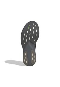Σόλα παπουτσιού με μαύρη και γκρίζα καουτσούκ, λευκά ορθογώνια σχέδια διάτρησης και πράσινο λογότυπο "Continental" σε λευκό φόντο.