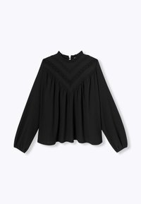 Blouse noire à manches longues, col froncé et détails texturés. Présente un corsage froncé et un motif géométrique subtil au niveau du col.