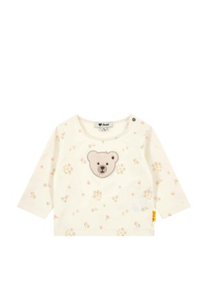 Langärmeliges Hemd in Cremefarbe mit einem Teddybären-Applikation und floralem Muster in weichen Pastellfarben. Mit Rundhalsausschnitt und Druckknopfverschluss.