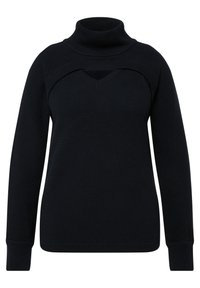 Schwarzer Strickrollkragenpullover mit strukturiertem Muster, der ein dreieckiges Ausschnittdetail an der Brust und gerippte Bündchen aufweist.