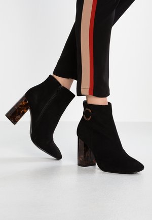 Bottines à talons hauts - black