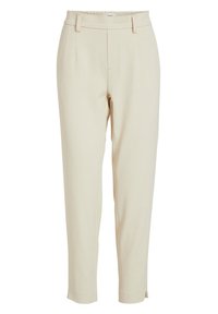 Pantalon beige à la coupe ajustée, avec une texture lisse, des plis avant et une taille élastiquée. Jambe raccourcie avec des fentes latérales.