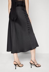 DRYKORN NEVIDA - Maxi skirt - black