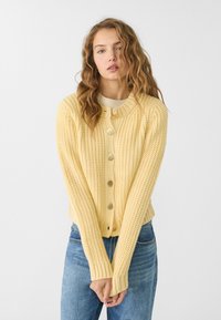 Vesta na kopčanje - yellow