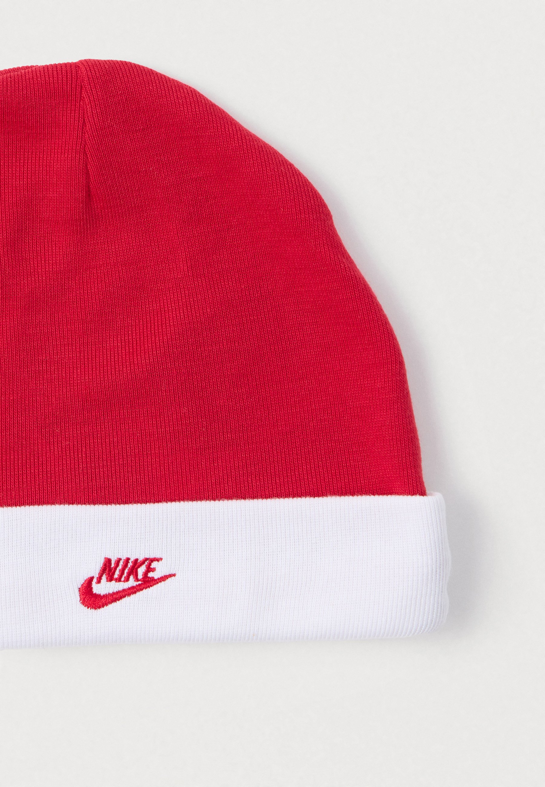 white and red nike beanie