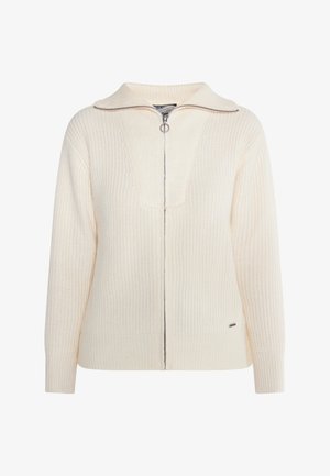 Sweter zapinany na zamek w kolorze kremowym, wykonany z teksturowanego dzianiny, z szerokim kołnierzem i srebrnym zamkiem błyskawicznym. Posiada mały detal z logo na dole.