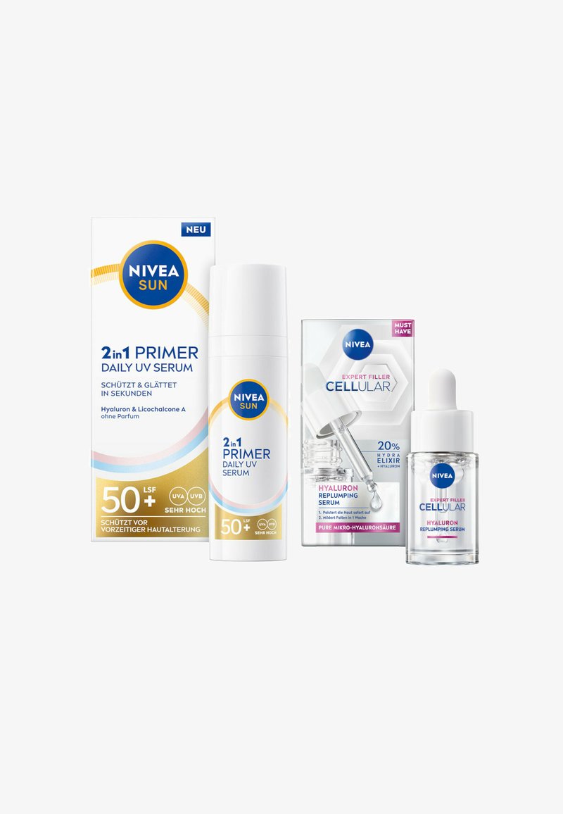 NIVEA products: white 2-in-1 primer with round cap, and clear dropper bottle serum with silver accents. Packaging displays product names and SPF details.