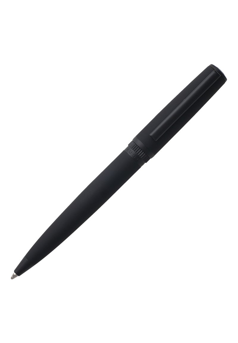Black ballpoint pen with a smooth, matte finish, cylindrical shape, and clip on the cap. Non-slip grip near the writing tip.