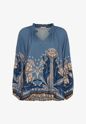 Blå bluse med blomstermønstre i beige og marineblå. Den har V-udskæring, rynket halsudskæring og elastiske manchetter samt en mønstret kant.