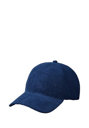 Marineblå kordfløjls baseballkasket med hævet "CK" logo broderi foran og buet skygge.