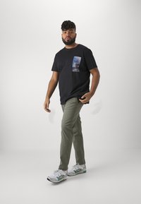 Jack's Sportswear SUPERFLEX PANTS - Hlače chino - light army