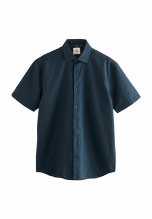 Košulja kratkih rukava u tamno tirkiznoj boji, izrađena od teksturiranog tkanja, s klasičnim ovratnikom i šest prednjih gumba te ravnim rubom.