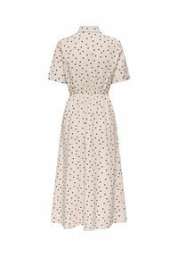 Robe midi de couleur crème à pois noirs, manches courtes, col et taille élastique vue de dos.