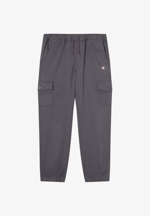Szare spodnie cargo wykonane z mieszanki bawełny. Posiadają elastyczny pas, sznurek do regulacji, dwie boczne kieszenie oraz dwie kieszenie cargo z zapięciami na guziki.