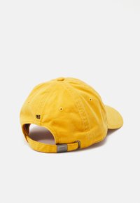 Tommy Hilfiger FLAG SOFT PANEL UNISEX - Sapka - city yellow
