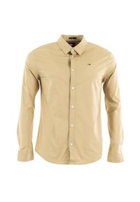 Camicia beige a bottoni realizzata in tessuto morbido, con maniche lunghe, colletto classico e una sottile ricamo del logo sul petto.