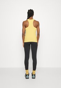 Athleta RENEW RACERBACK SEAMLESS TANK - Top - lunaria yellow