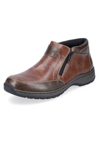 Braune Leder-Stiefeletten mit einem seitlichen Reißverschluss, gestickten Akzenten und einer schwarzen Gummisohle für besseren Halt und Komfort.