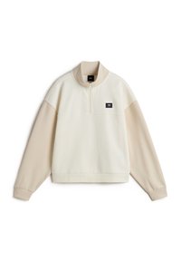 Sweatshirt à demi-zip en crème et beige, avec des manches longues, des poignets côtelés et un patch en tissu de marque sur la poitrine. Tissu texturé doux.