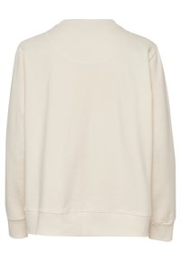 Sweatshirt beige, texture douce, col ras du cou, épaules tombantes, bords côtelés aux poignets et à l'ourlet, design uni, sans logos ni motifs visibles.