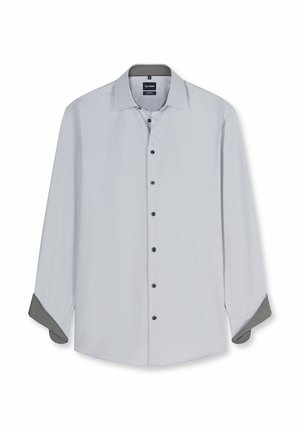 Light grey long-sleeve men's dress shirt with black buttons, classic collar, and dark patterned inner cuffs rolled up.