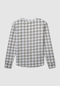 Chemise à manches longues avec un motif pied-de-poule en brun clair et blanc, dotée d'un col rond et d'une texture douce.