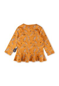 Long-sleeve, mustard-colored top with a ruffled hem. Features a leaf and star pattern in dark brown on a textured fabric.