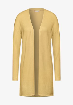 Jasnożółty długi kardigan z miękkiego materiału dzianinowego, z otwartym przodem i długimi rękawami, o luźnym kroju i bez zapięć.