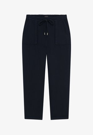 Marineblauwe sweatpants met een tailleband met trekkoord, twee voorzakken en een taps toelopend ontwerp. Gemaakt van zachte, gestructureerde stof.