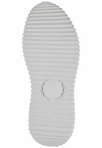 Weißer Gummisohlen mit horizontalen Rillen und einem kreisförmigen, erhöhten Bereich in der Mitte. Die Ränder sind gewellt für besseren Halt und Struktur.