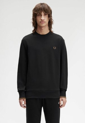 Sweatshirt noir en mélange de coton, avec un col rond côtelé, des manches longues et un petit logo doré sur la poitrine, ainsi que des poignets rayés.
