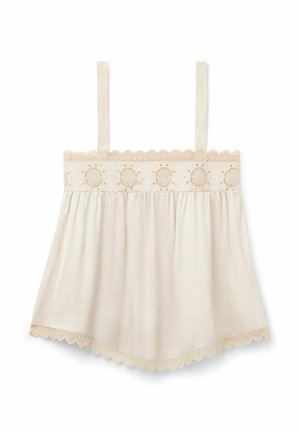 Cremafarbenes ärmelloses Top mit dünnen Trägern, besticktem Blumenband über der Brust und gewelltem Spitzenbesatz an Saum und Ausschnitt.