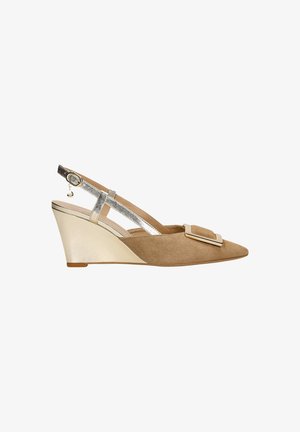 Wedge shoe with a tan suede upper, silver metallic accents, a pointed toe, and buckle detail, featuring an adjustable slingback strap.